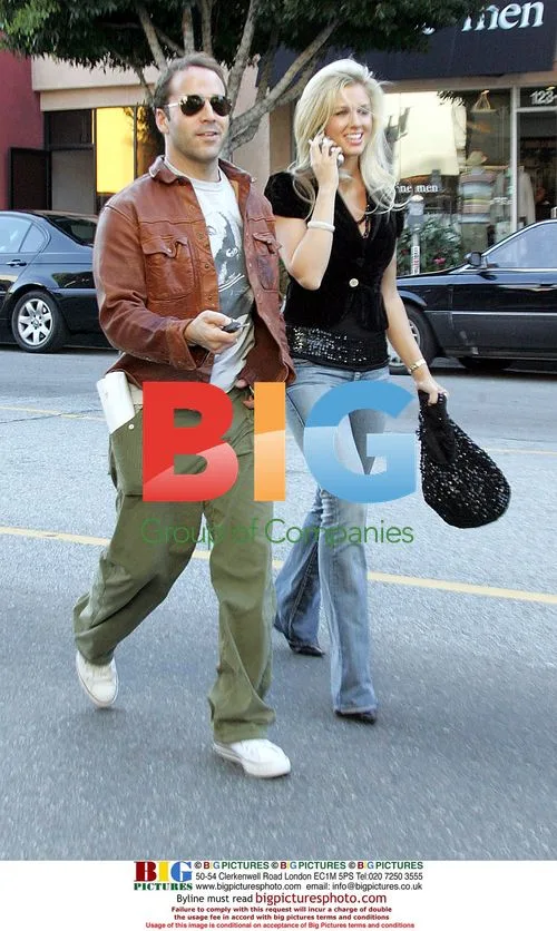 Jeremy Piven strolls with blonde