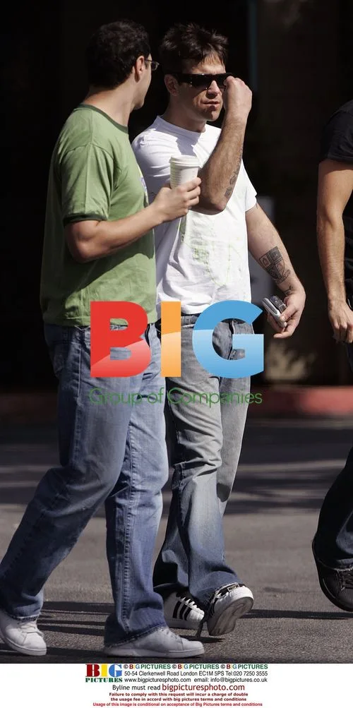 Popstar Robbie Williams out with friends