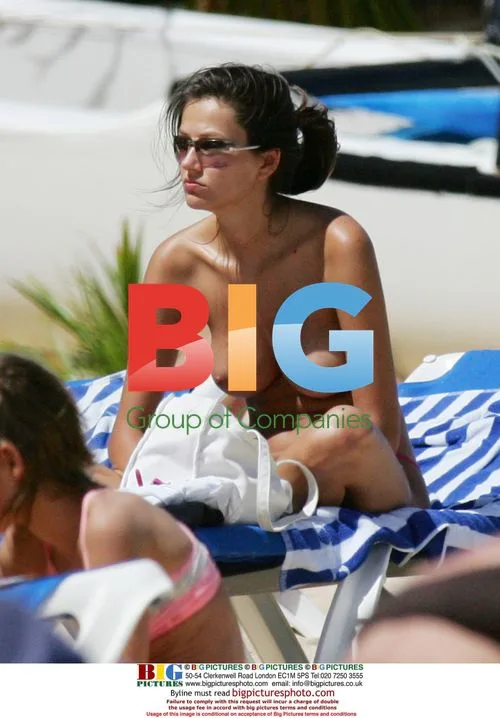 Anna Draganska topless sunbathing in St Barths