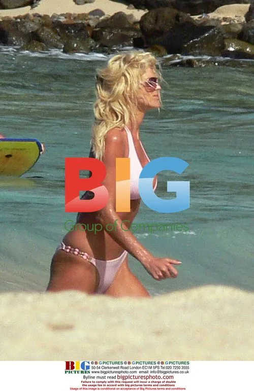 Victoria Silvstedt Relaxes on Caribbean Beach