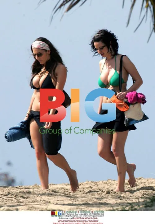 Buxom models Lucy Pinder and Sophie Howard on holiday