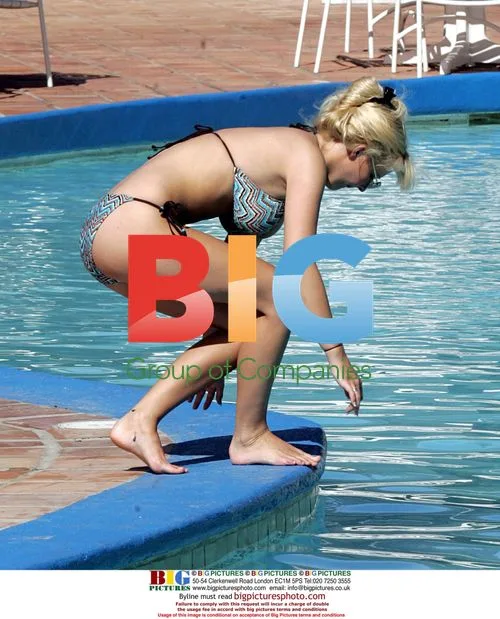 Model Michelle Marsh Sunbathing in Caribbean