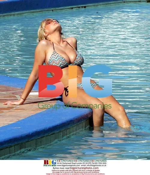 Model Michelle Marsh Sunbathing Topless