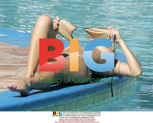 Model Michelle Marsh Relaxing by Pool
