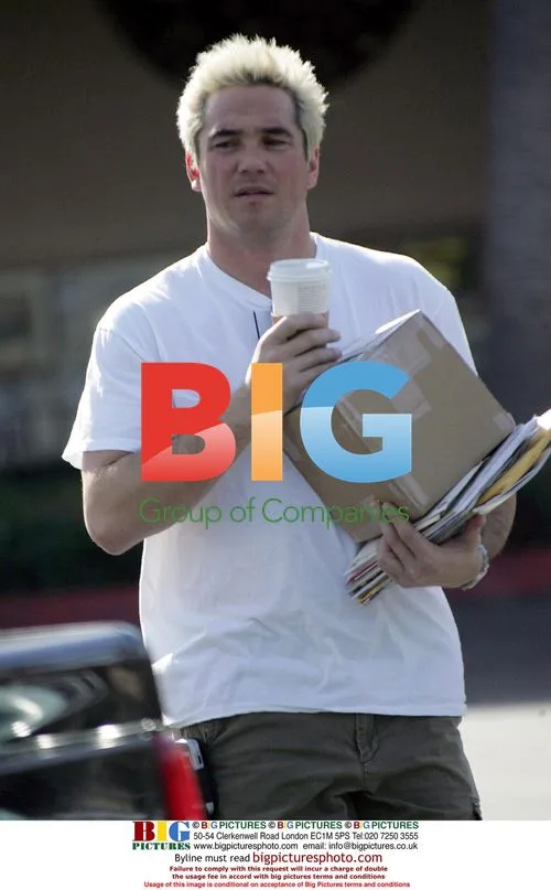 Dean Caine Carries Packages with Son