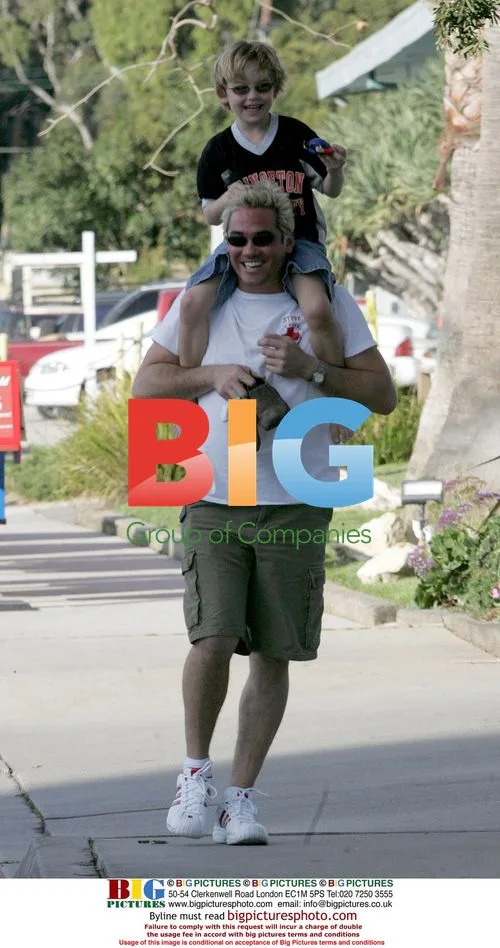 Dean Caine and son visit Malibu post office