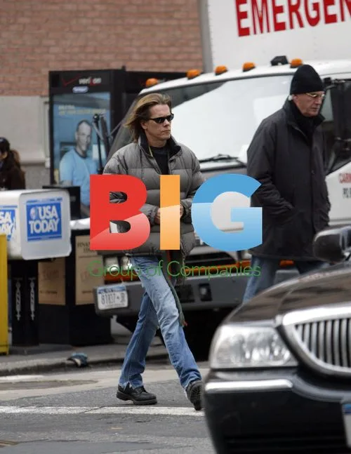 Kevin Bacon Exits Store with Hair Product