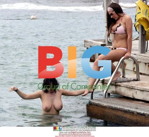 Glamour Models Lucy Pinder and Sophie Howard Cool Down in St Lucia