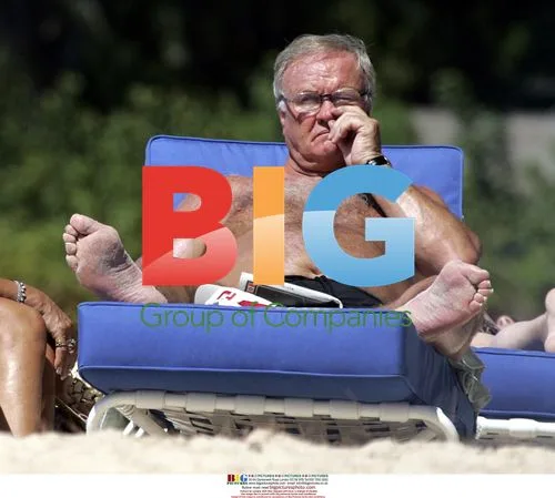 Ron Atkinson Relaxing on Barbados Beach