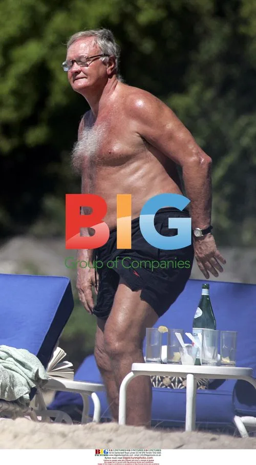 Ron Atkinson Relaxing on Barbados Beach