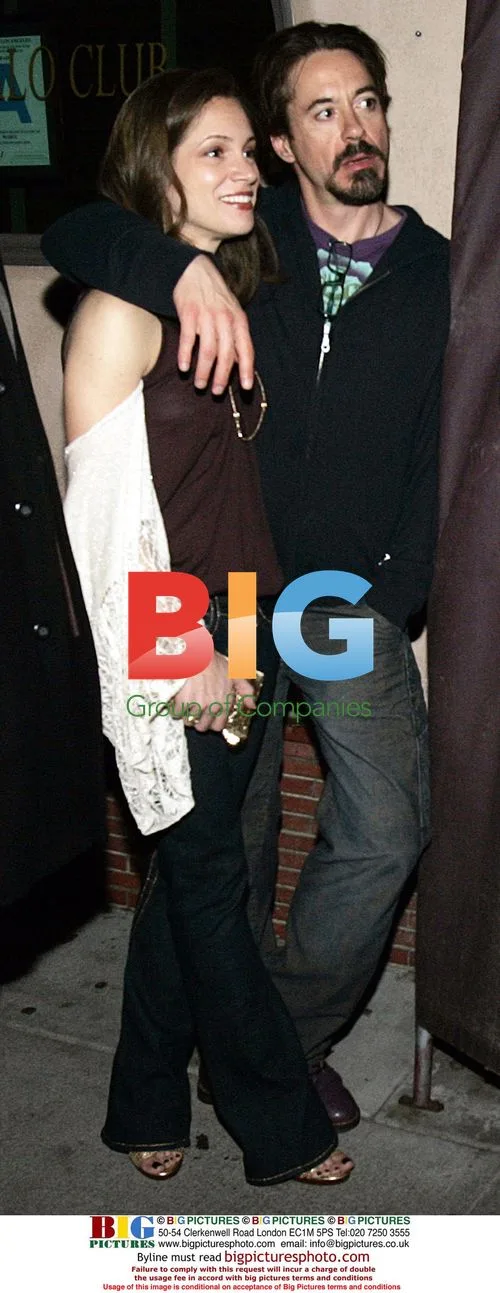Robert Downey, Jr and Susan Levin at CAA party