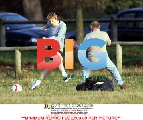 Euan Blair playing football with friends
