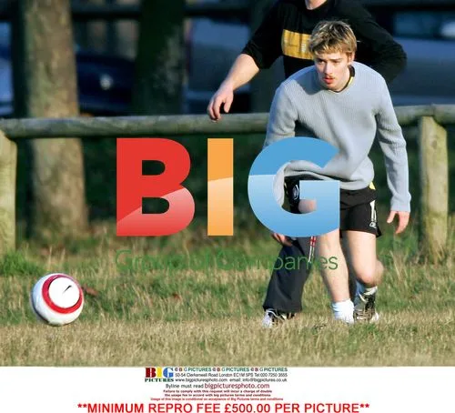 Euan Blair plays football with friends