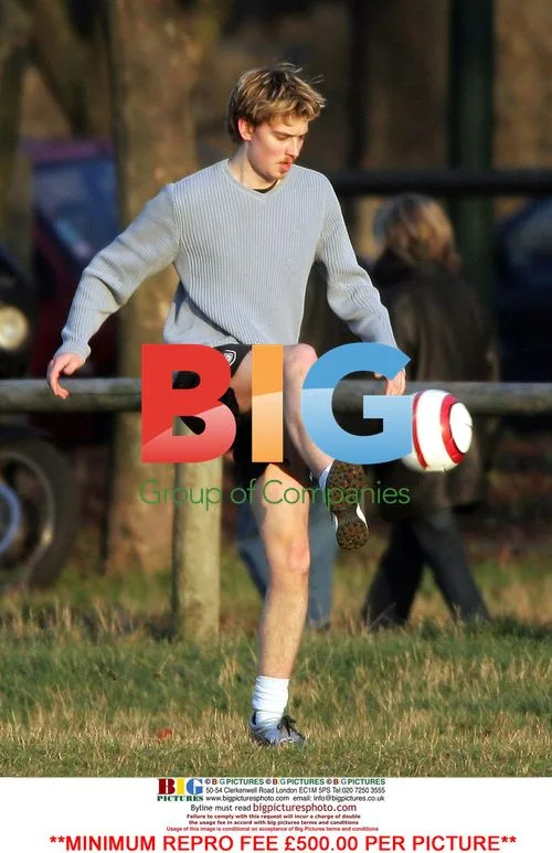 Euan Blair plays football with mates in Paris