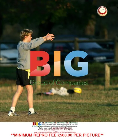 Euan Blair plays football with friends