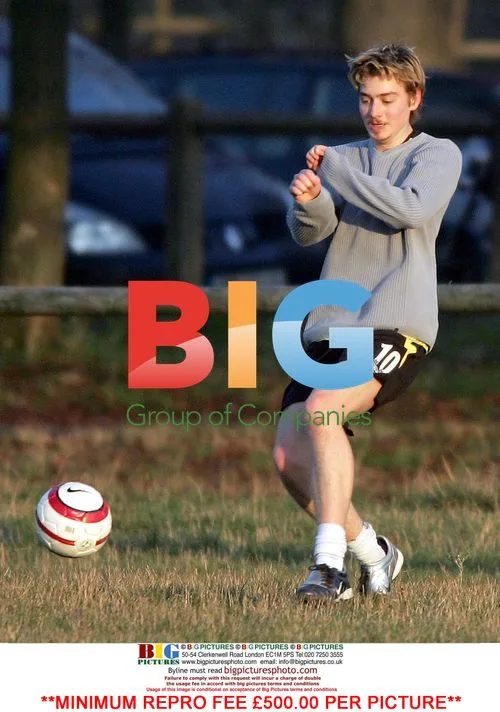 Euan Blair plays football with girlfriend