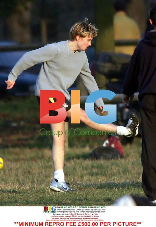 Euan Blair plays football with girlfriend