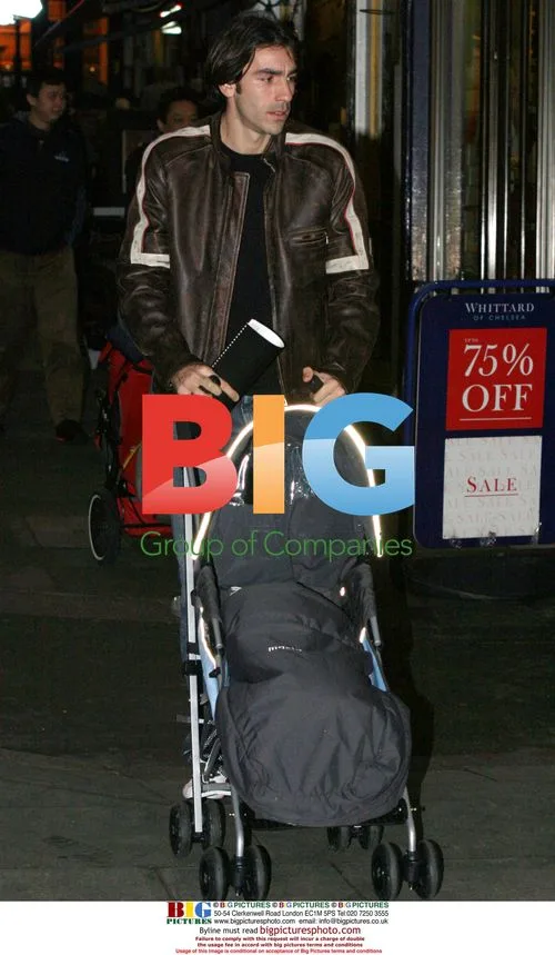 Robert Pires out with girlfriend and baby