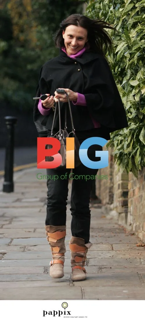 Jayne Middlemiss chats on mobile in London