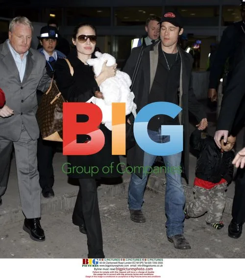 Angelina Jolie and Brad Pitt with children at Heathrow