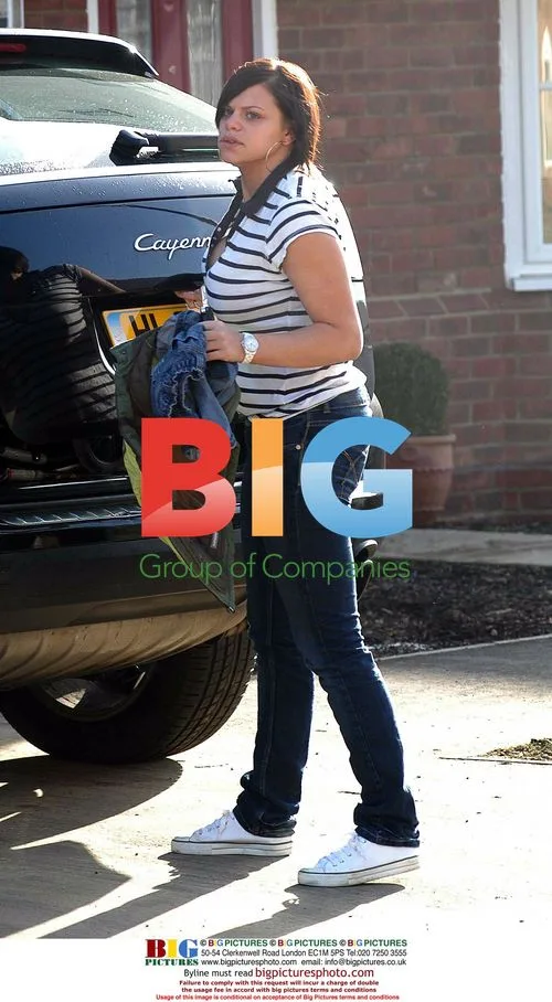 Jade Goody Leaves Friend's House with Toys