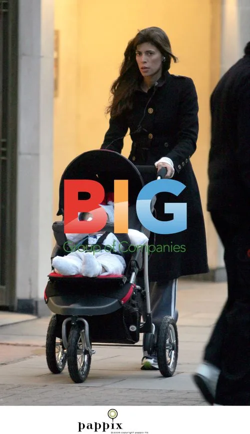 Lisa Barbuscia AKA Lisa B strolls with baby in London