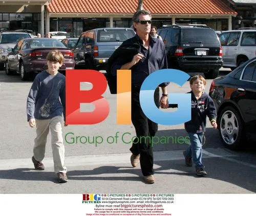 Pierce Brosnan and sons visit pet store