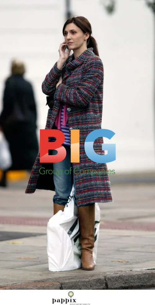 Jayne Middlemiss looking bored while shopping