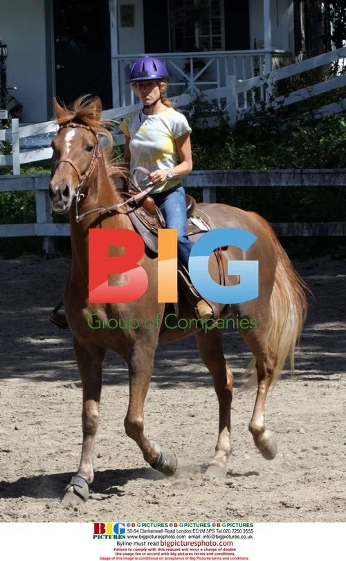 Sheryl Crow rides horse