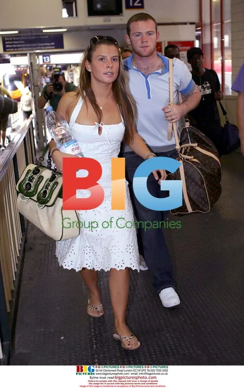 Wayne Rooney and Coleen Arrive in London