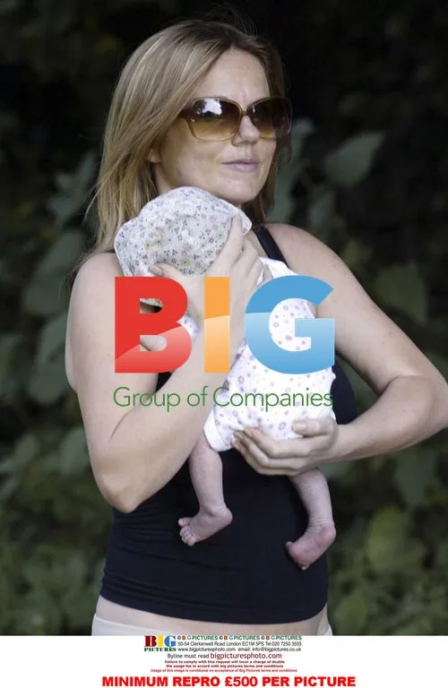 Geri Halliwell Leaves London Clinic with Daughter