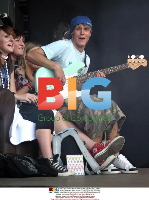DOUGIE of MCFLY on stage at Wave party