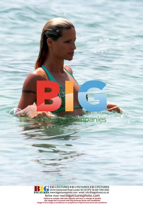 Michelle Hunziker on beach vacation