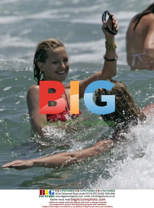 Kate Hudson Sunbathes in Bikini in Malibu