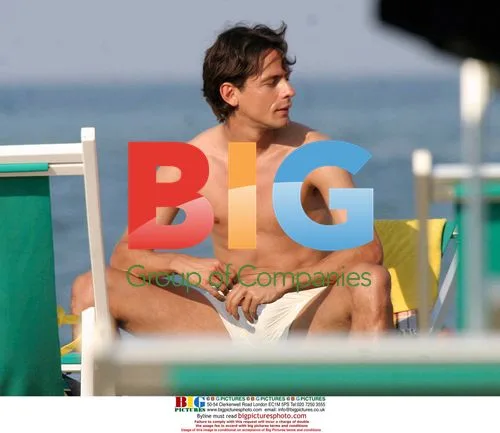 Pippo Inzaghi and Massimo Giletti on beach