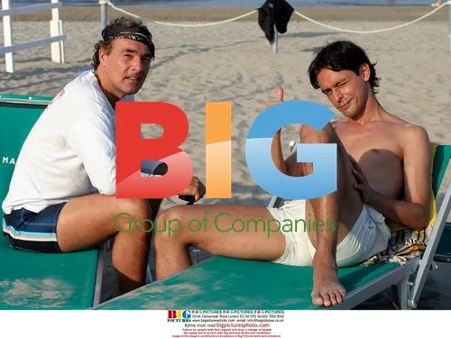 Footballer Pippo Inzaghi on the beach with friend Massimo Giletti