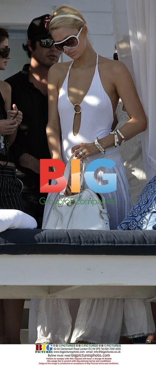 Paris Hilton and Nicky Hilton attend Lindsay Lohan's Malibu Beach Party