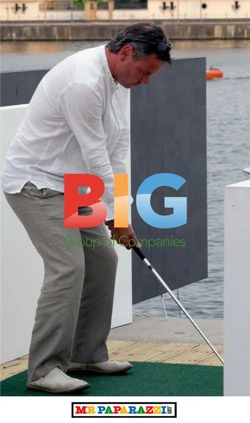 Celeb chefs hit golf balls at British Motorshow