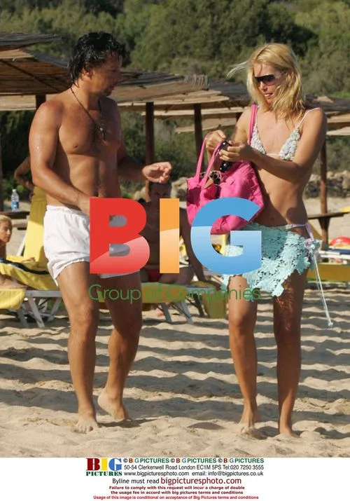 Valeria Mazza and husband on holiday in Porto Cervo