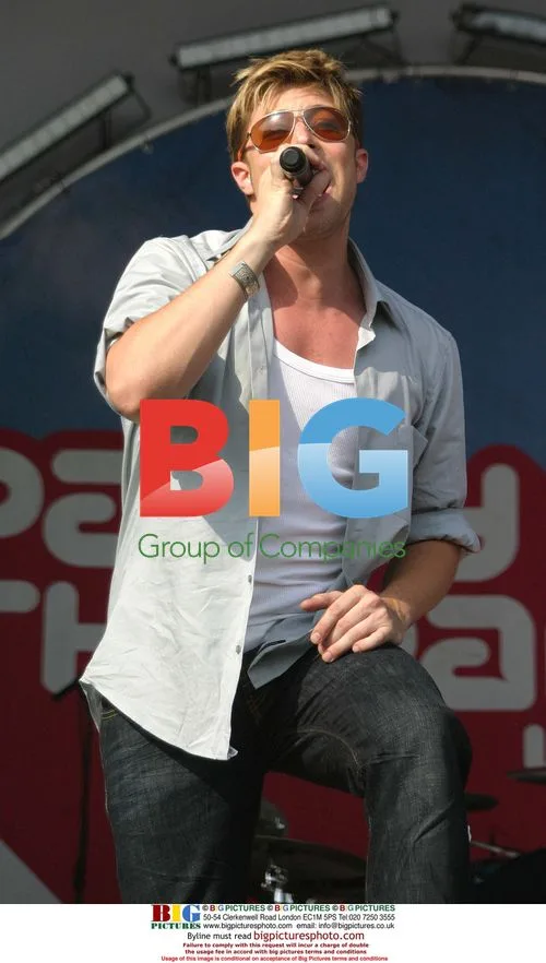 DUNCAN JAMES with daughter at Radio Aire Party In The Park