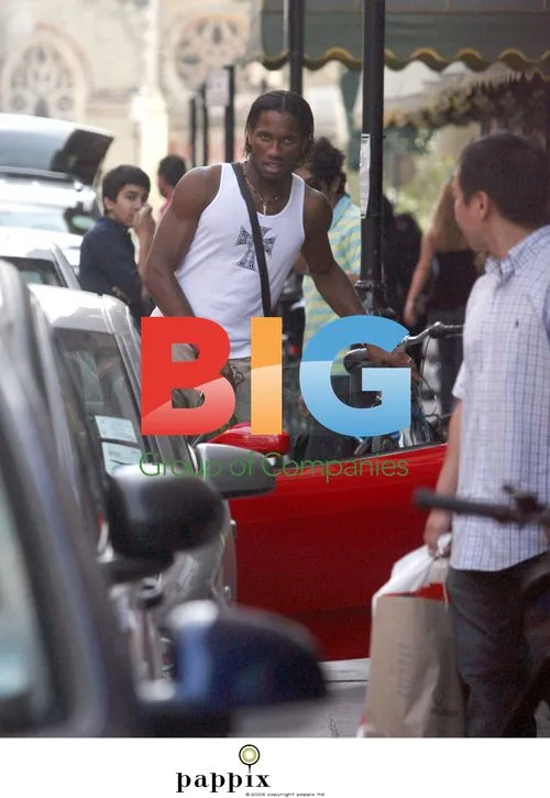 Didier Drogba out in London in new Ferrari
