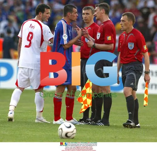Willy Sagnol and Referee Discuss Yellow Card