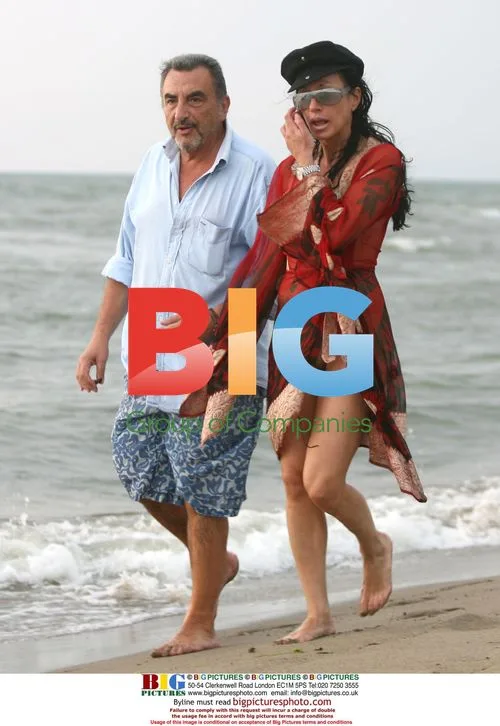 Nancy Dell'Olio and friend on the beach