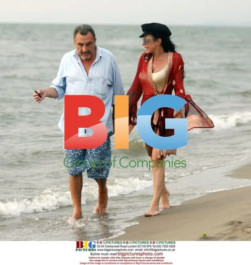 Nancy Dell'Olio and friend on beach in Fregene