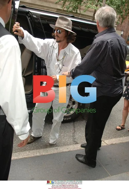 Johnny Depp Signs Autographs at Hotel