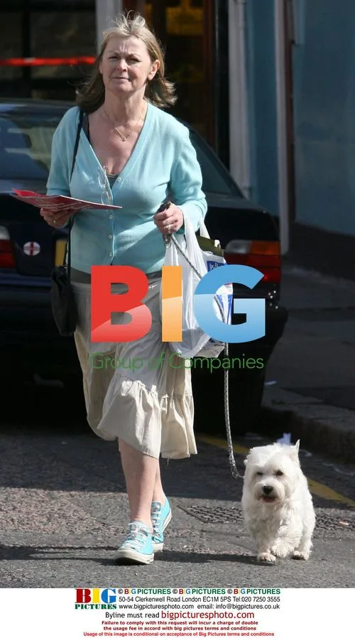 Sue Cook Takes Dog for Walk in North London