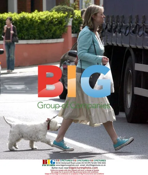 Sue Cook walks dog in London