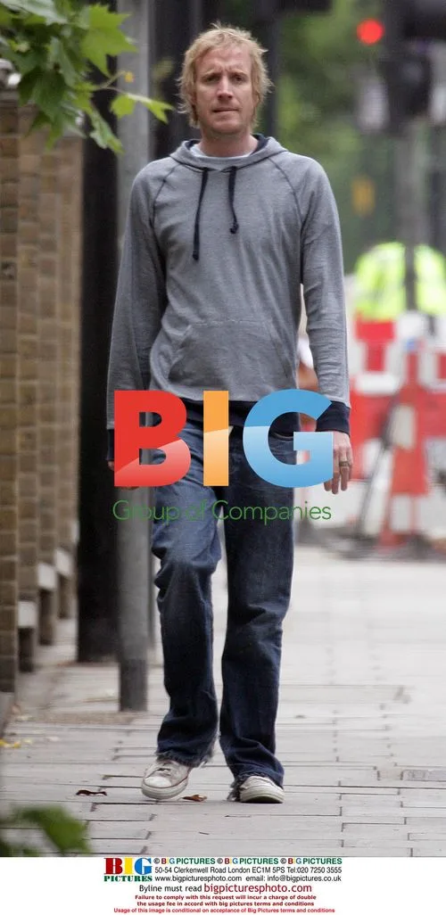 Rhys Ifans enjoys stern walk in London