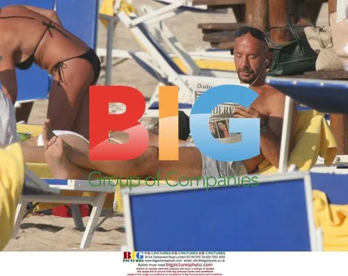 Footballer Gianluca Vialli on the beach