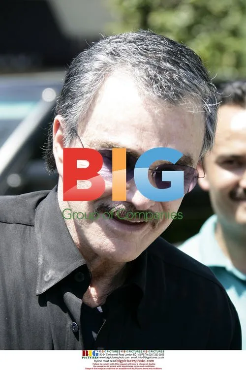 Burt Reynolds goes shopping at Western store